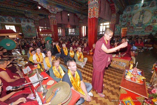 The team in the gompa with 2000 practitioner
