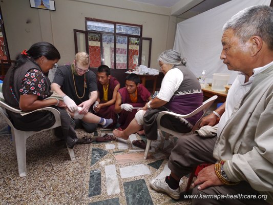 The monks learn and put skills into practice by assisting