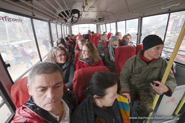 Hiring a bus to go on a pilgrimage to the Mahakala Caves