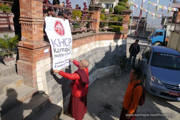 KIBS Shangpa Rinpoche setting up the medicalcamp posters