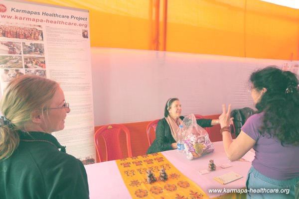 KHCP info desk in the Mönlam Committee tent